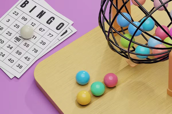 Bingo Puns with colorful numbered bingo balls and a bingo card