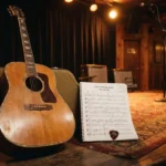 Guitar Puns featuring an acoustic guitar, music notes, and a guitar pick